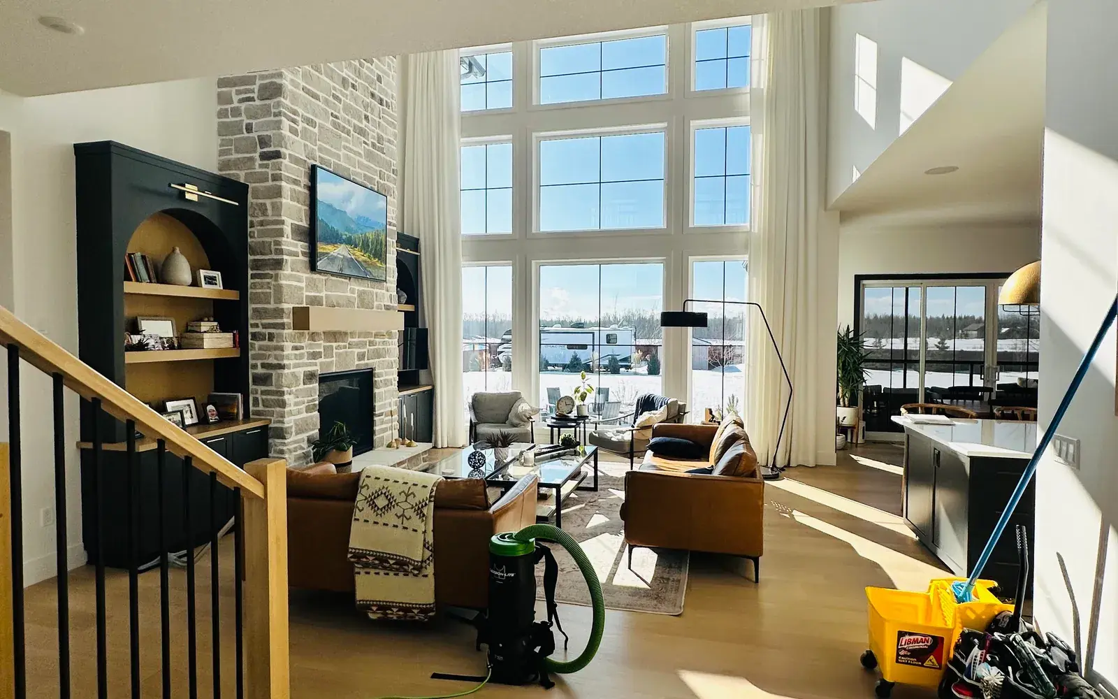 Professional home and office deep cleaning in a bright modern Grande Prairie living room