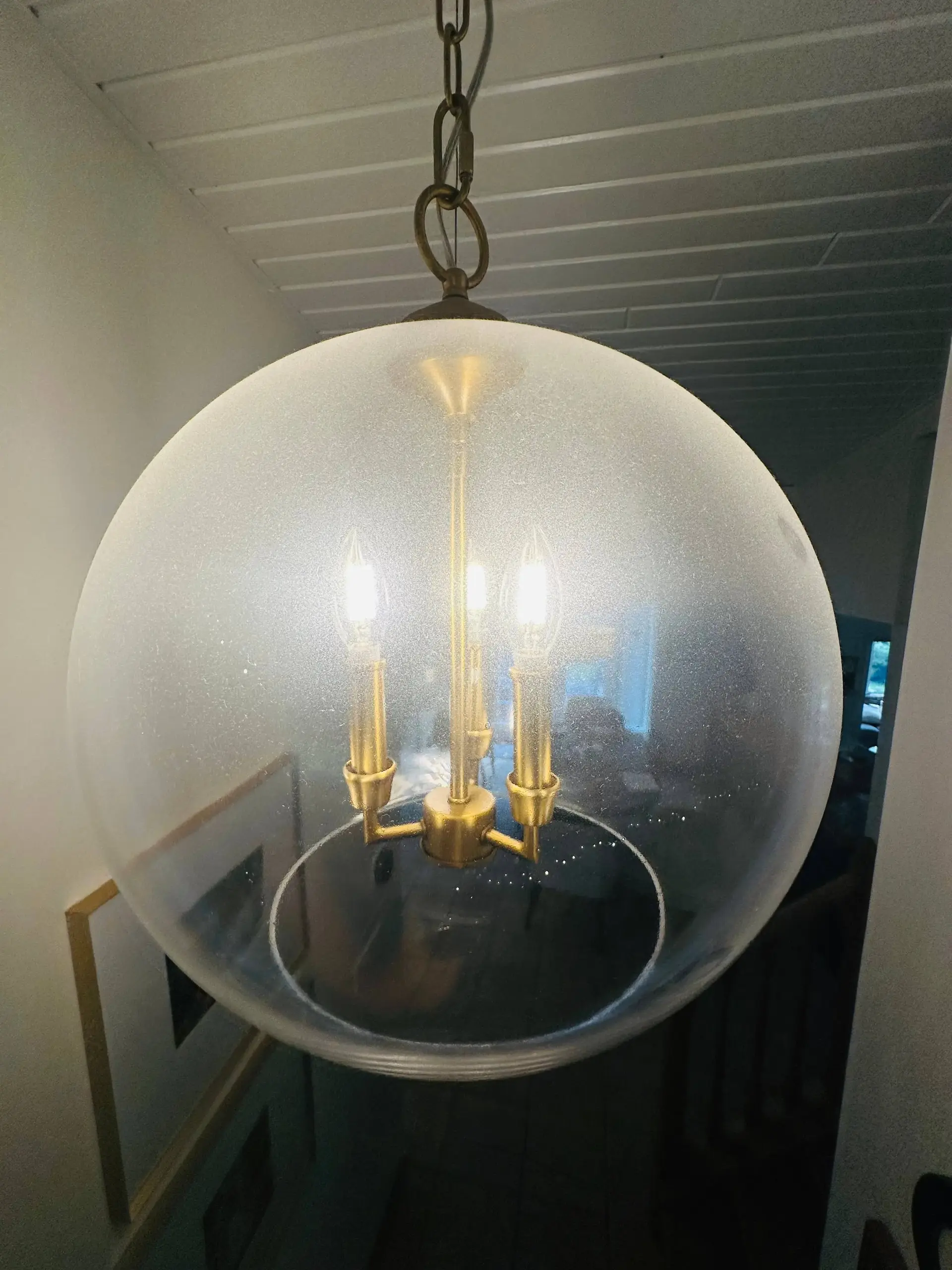 Dusty light fixture before cleaning