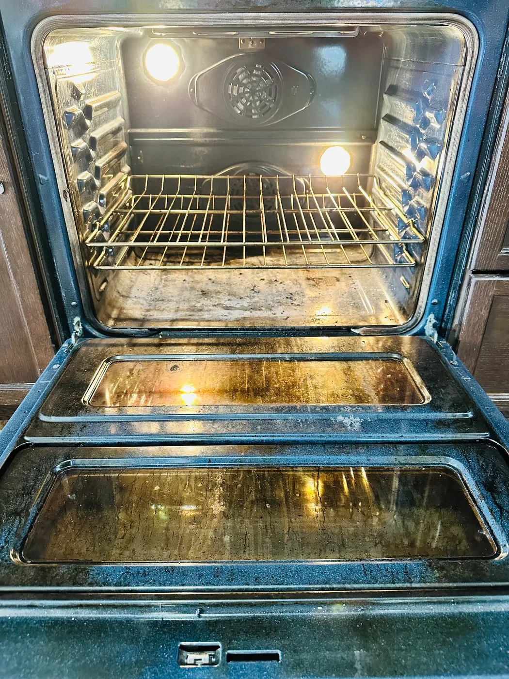 Greasy oven interior before deep cleaning